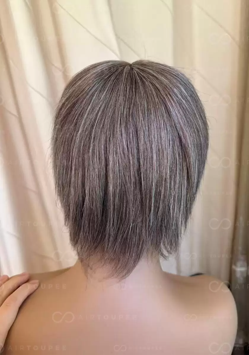 Size 9.5x6.3 inches with silk base brown color with 35% grey hair mixed lace in hairline very natural look